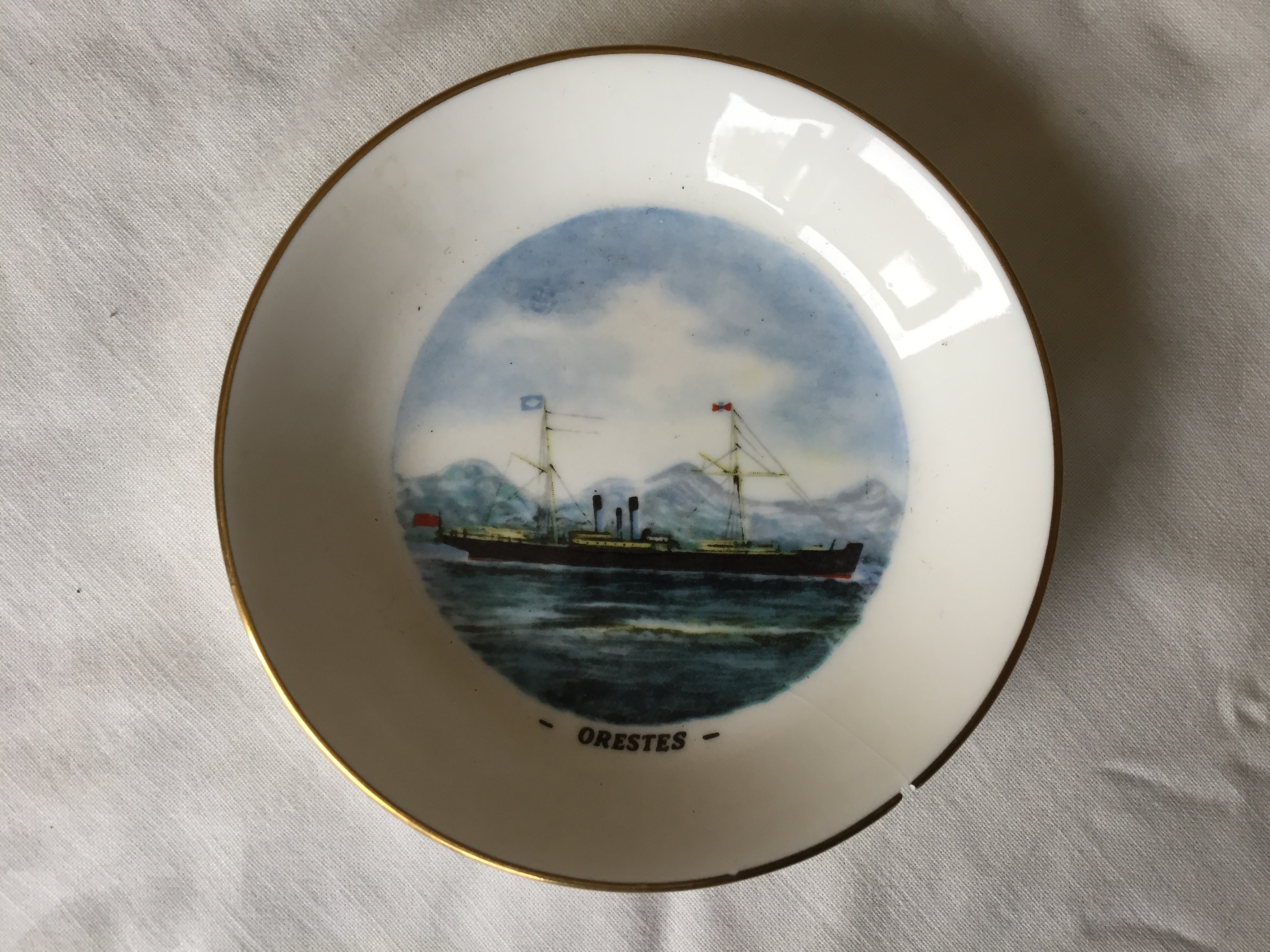 A SOUVENIR ROYAL WORCESTER DISH FROM THE BLUE FUNNEL LINE VESSEL THE ORESTES